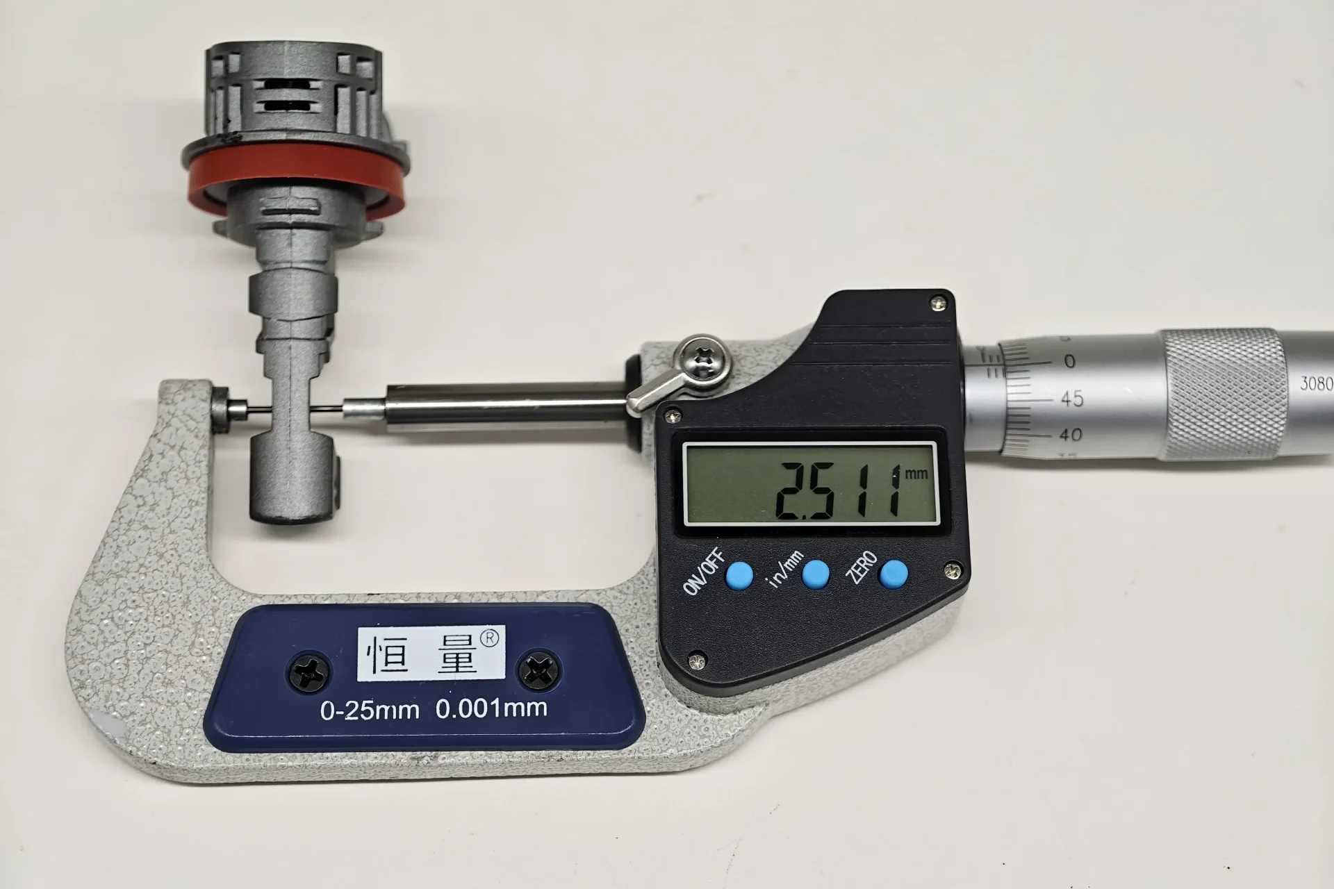 Micrometer measurement of the 2.511 mm separation between opposing E4E H11 LEDr emitting surfaces
