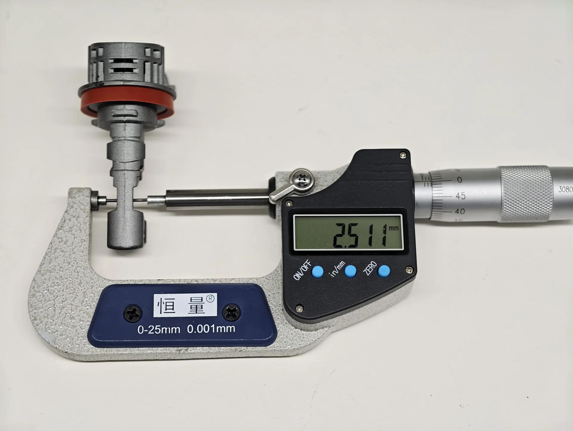 Micrometer measurement of the 2.511 mm separation between opposing E4E H11 LEDr emitting surfaces